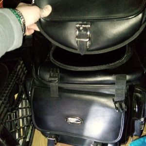 Saddle men bag for a motorcycle